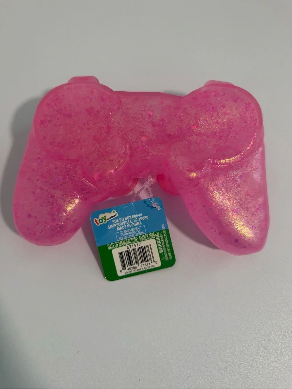 Squeeezy squishy game controller by Toymendous New pink fidget toy